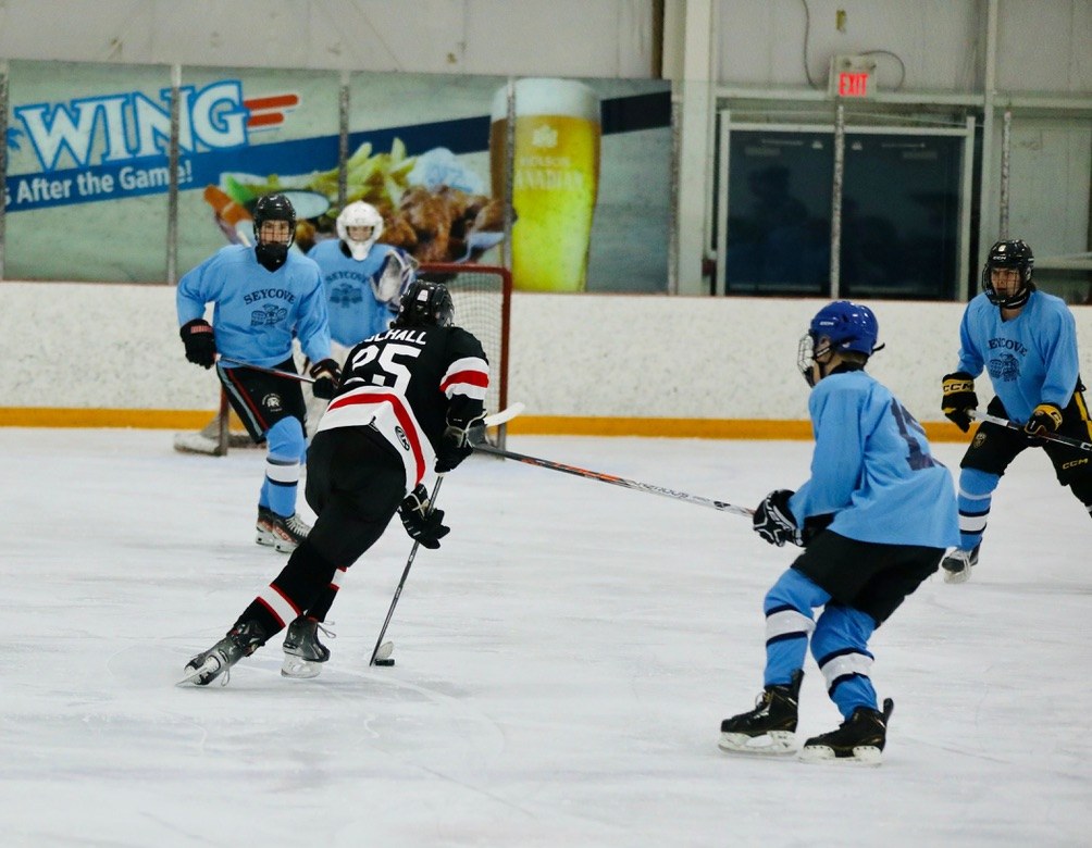 Justin playing hockey